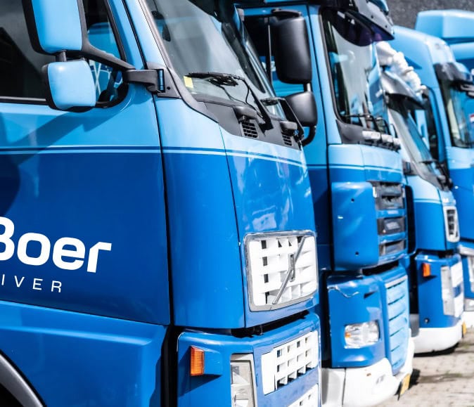 Trucks in a row viewed from the side